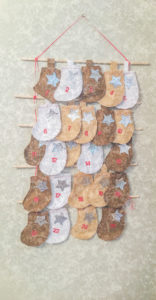 Countdown to Christmas with this beautiful sew! The Stocking Advent Calendar sewing pattern will become a treasured family heirloom.