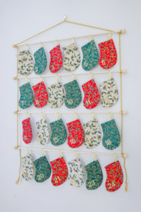 Countdown to Christmas with this beautiful sew! The Stocking Advent Calendar sewing pattern will become a treasured family heirloom.