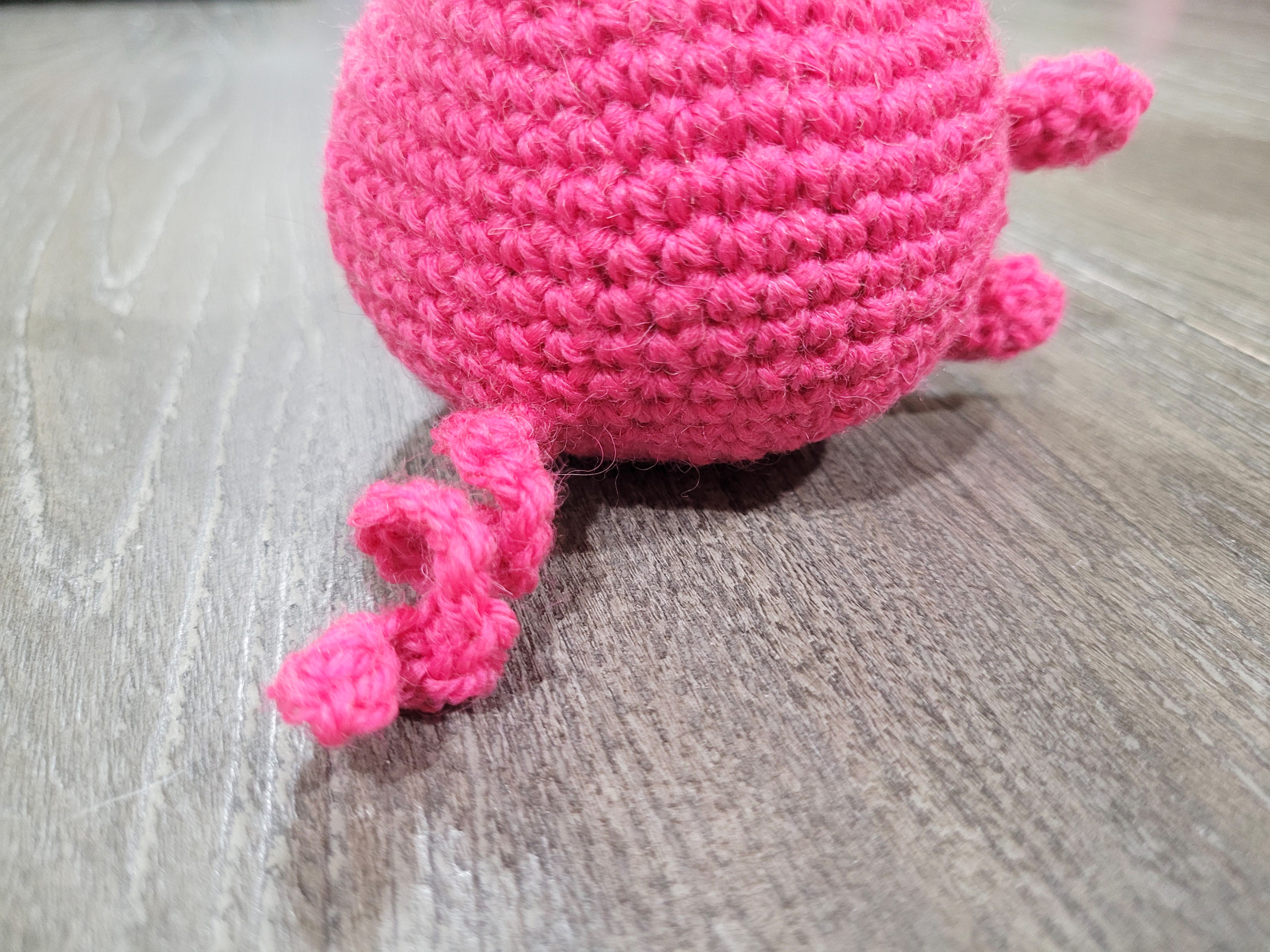 Create the perfect playtime pal with this sweet crochet roly polly piggy pattern. A lovely cuddle buddy, farmyard addition, or decor item, the Roly Polly Piggy is a cute stuffed toy with a friendly face