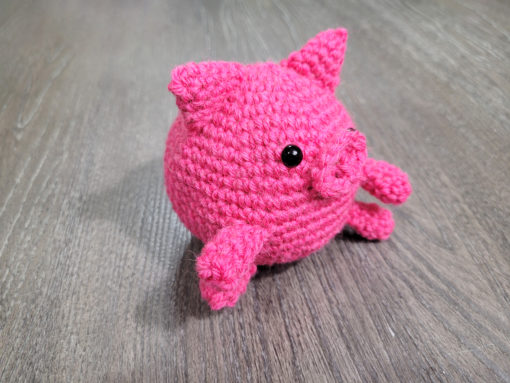 Create the perfect playtime pal with this sweet crochet roly polly piggy pattern. A lovely cuddle buddy, farmyard addition, or decor item, the Roly Polly Piggy is a cute stuffed toy with a friendly face